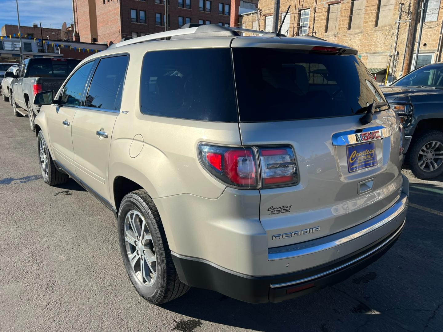 2016 Beige /Charcoal GMC Acadia SLT (1GKKVRKD2GJ) with an 3.6L V6 engine, automatic transmission, located at 116 5th Avenue South, Lewistown, MT, 59457, 47.063877, -109.427879 - Clean local trade with lots of options! Heated leather, sunroof, DVD! - Photo#3